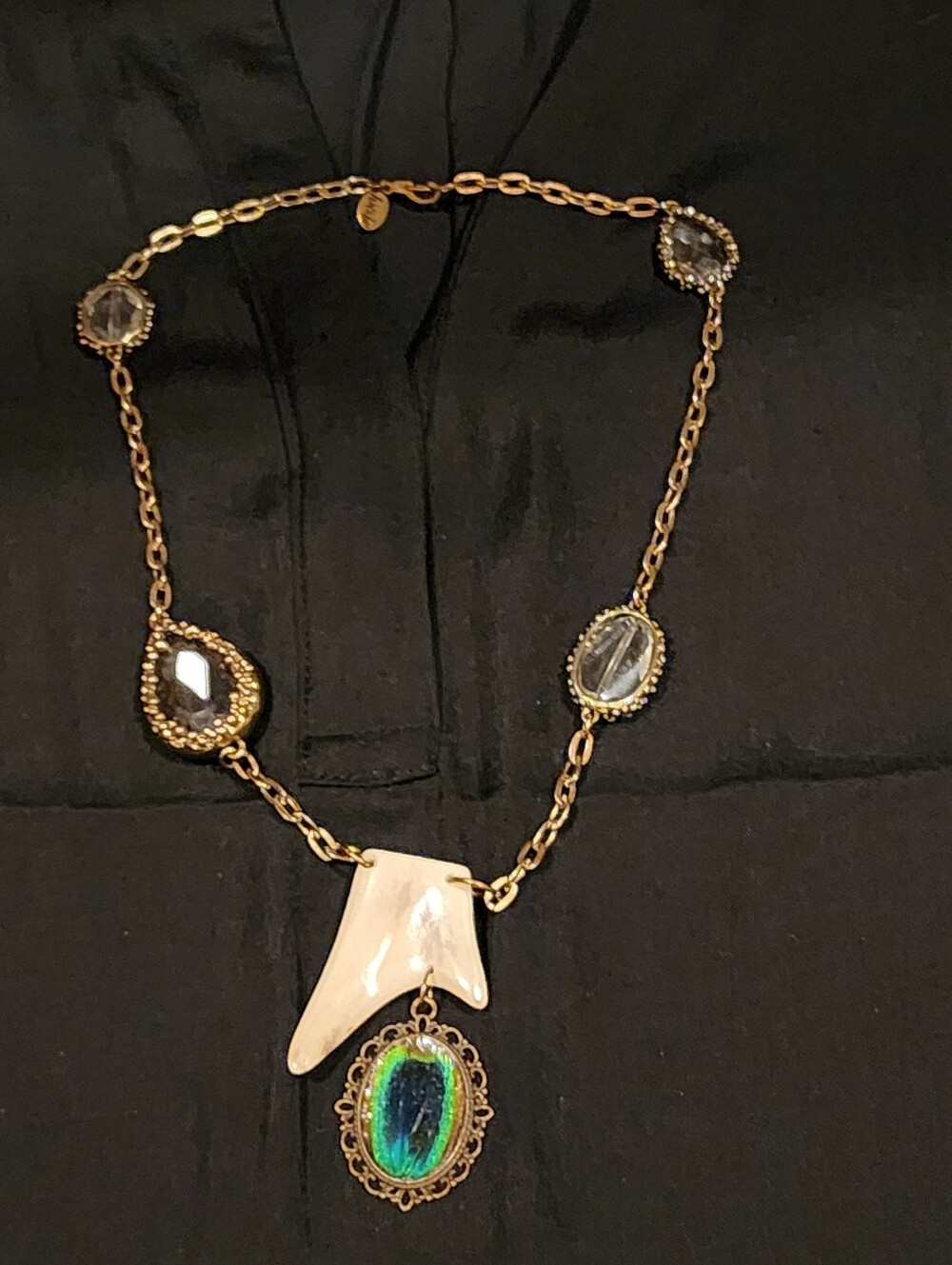 Handmade Bone and Crystal Necklace with Peacock Feather Pendant